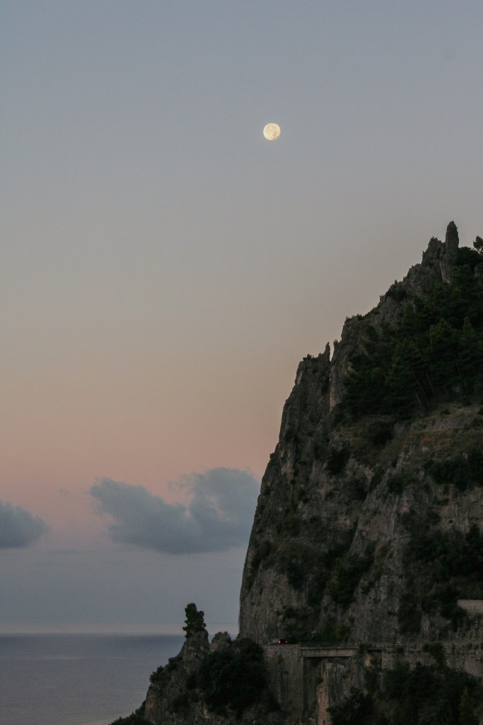 early morning shot of the moon in the Amalfi coast