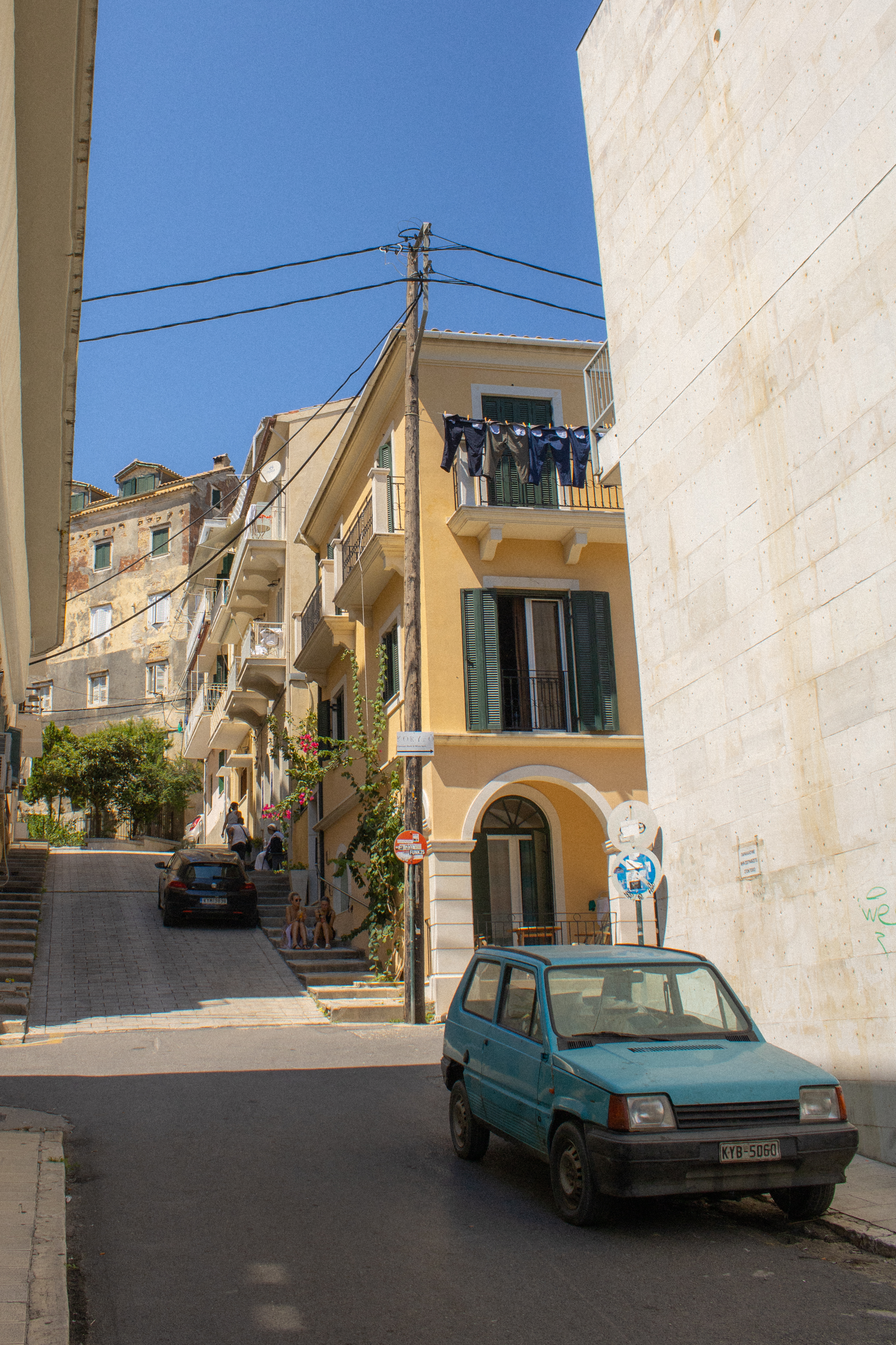Street shot of blue car in Corfu, Greece